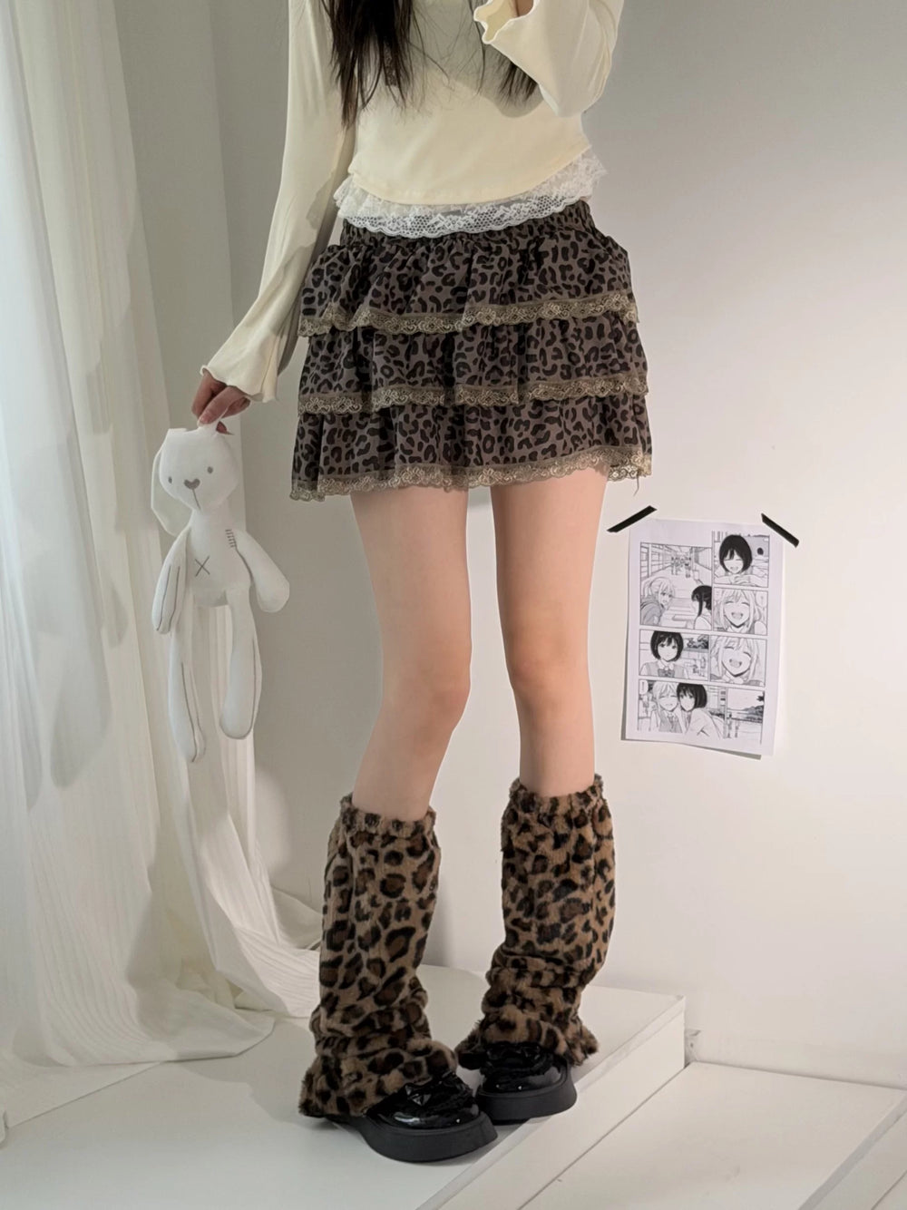 Coffee leopard-print plush leg warmers with a flared slouch