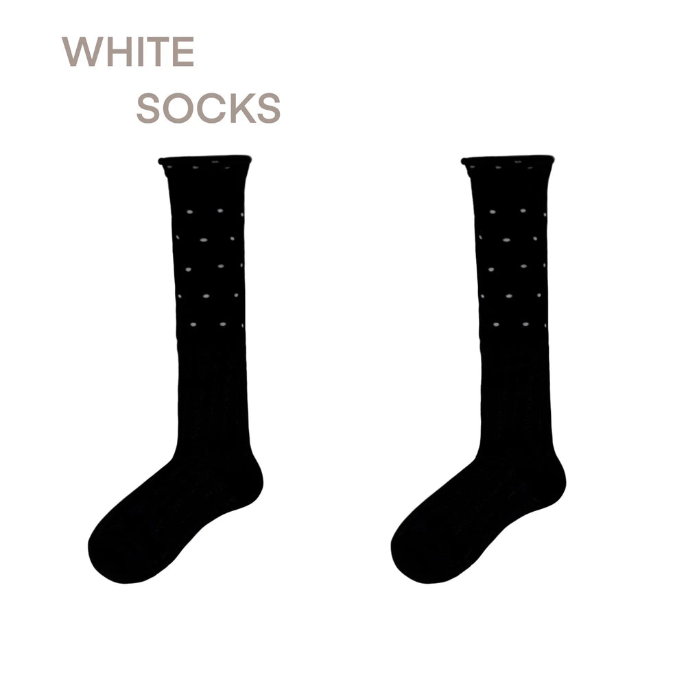 White polka dot mid-calf sock with scalloped lace cuff