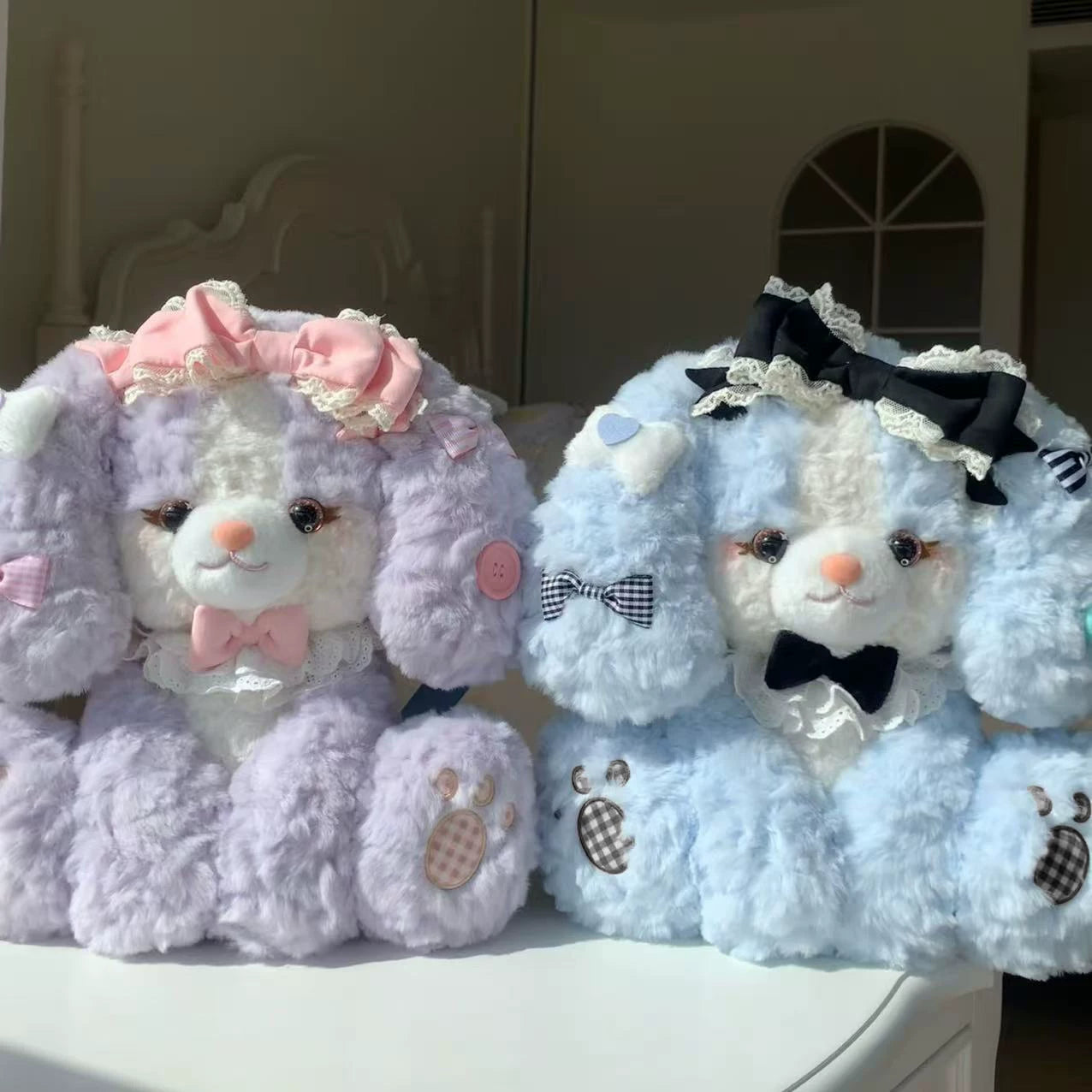 Plush Lolita backpack featuring cocker spaniel doll face accent