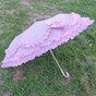 Pink folding parasol - transparent UV layer - self-fabric trim