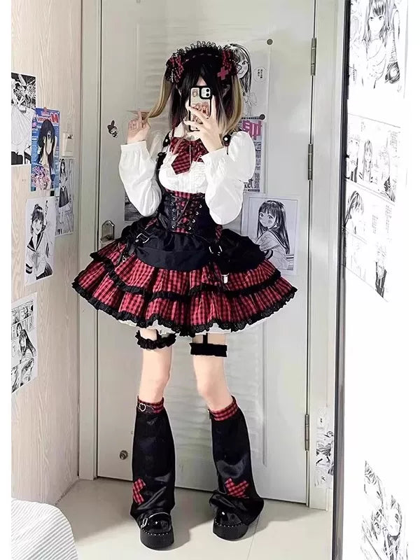 Gothic Lolita plaid coord set with black vest, white blouse, and tiered skirt