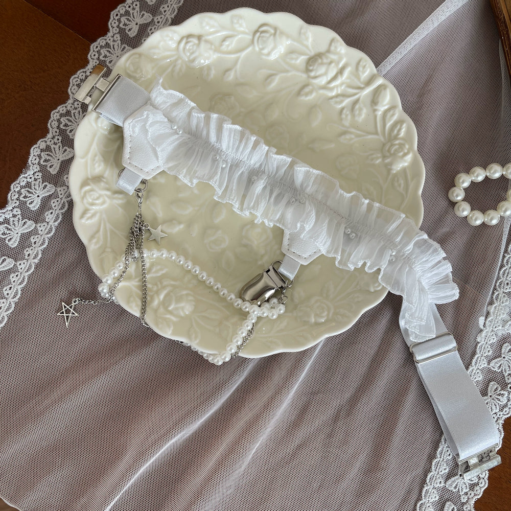 White lace over-the-knee stockings and rabbit-ear sock covers styled with a pearl leg ring