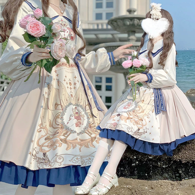 Baozi Pig cream one-piece dress with printed panel and blue ruffled hem