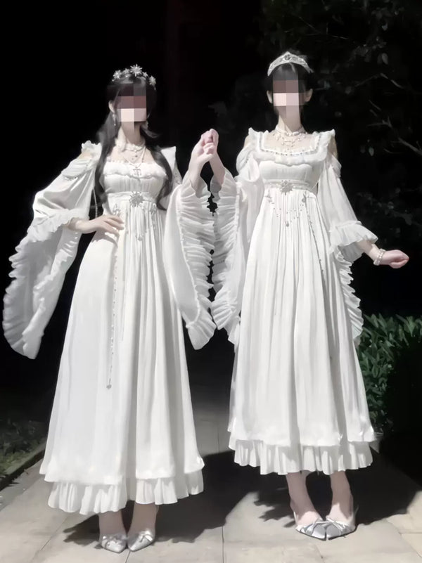 White empire-waist Lolita OP dress with lace neckline and ruffled sleeves