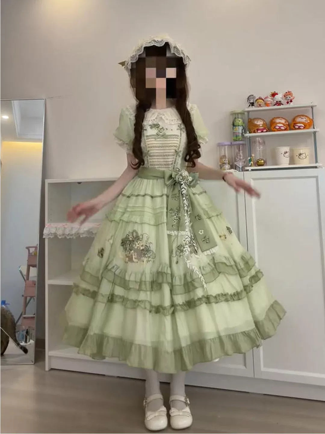 Detail of embroidered bodice and waist sash on green Lolita OP dress