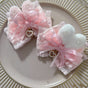 Pair of mixed-color bunny-ear side clips