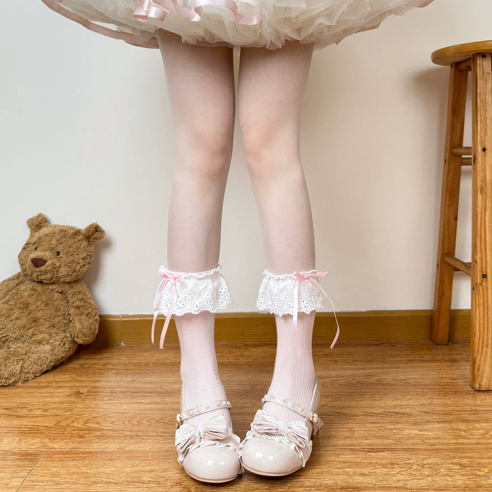 White mid-calf Lolita sock with white bow and lace trim
