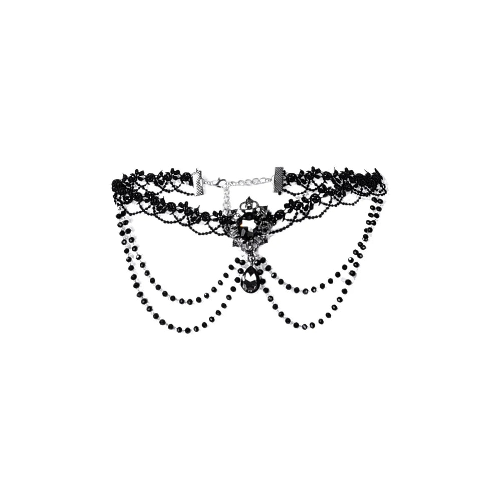 Black lace choker with layered chains and a central black gemstone.
