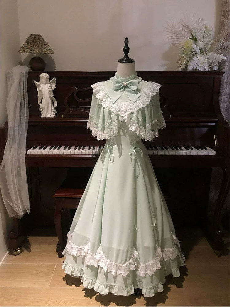 Mint green sweet Lolita OP dress with white lace capelet and center neck bow