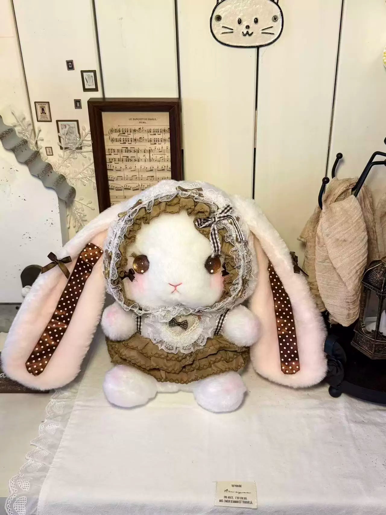 Brown plush lop bunny Lolita bag with satin accents, crossbody and backpack style