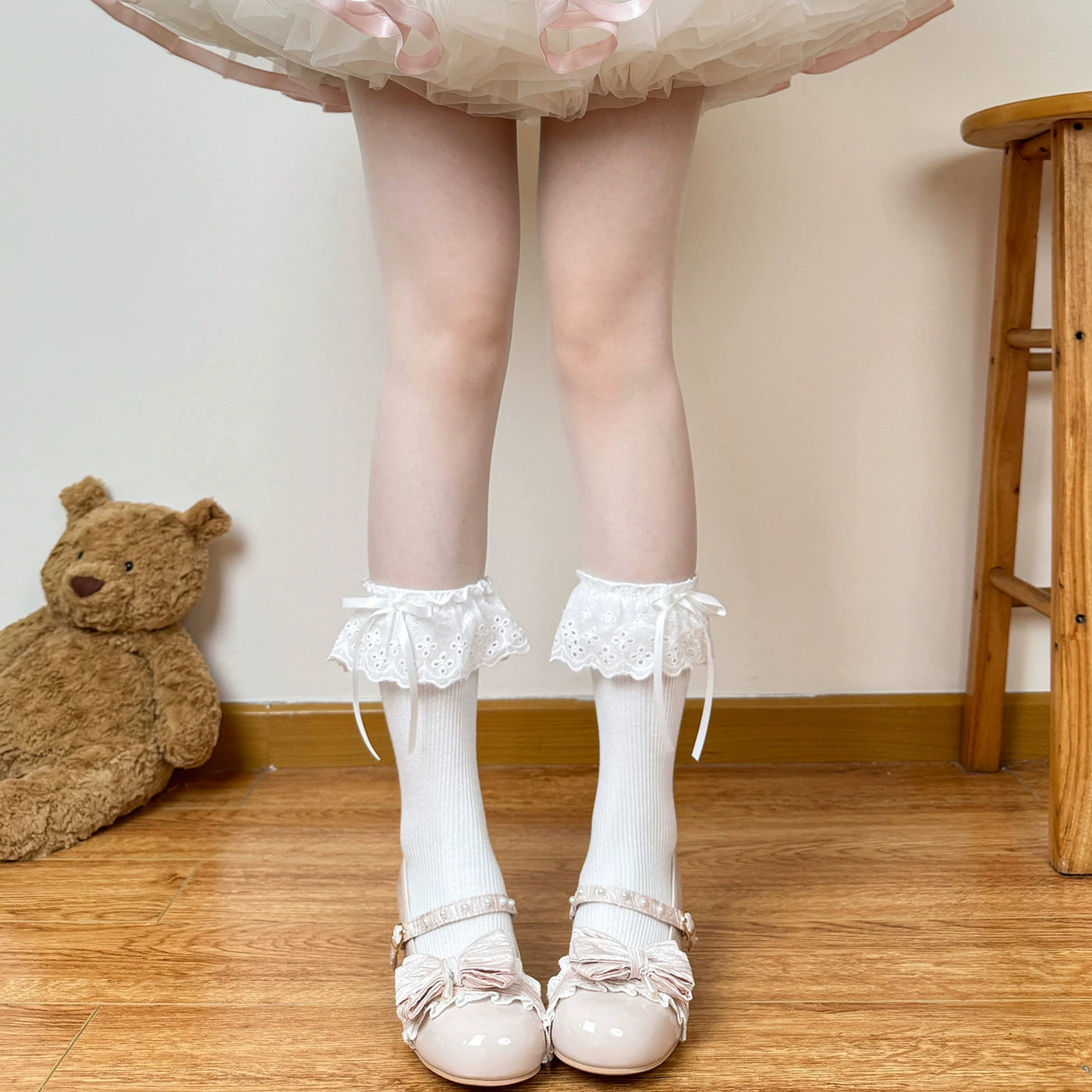 Pink mid-calf Lolita sock with pink bow and lace trim