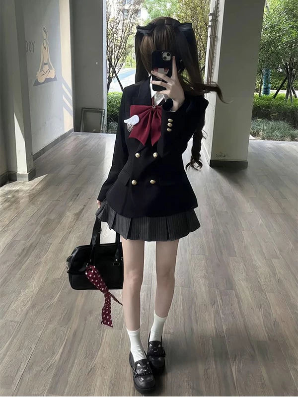 Black long-sleeve jacket and pleated skirt set with burgundy bow