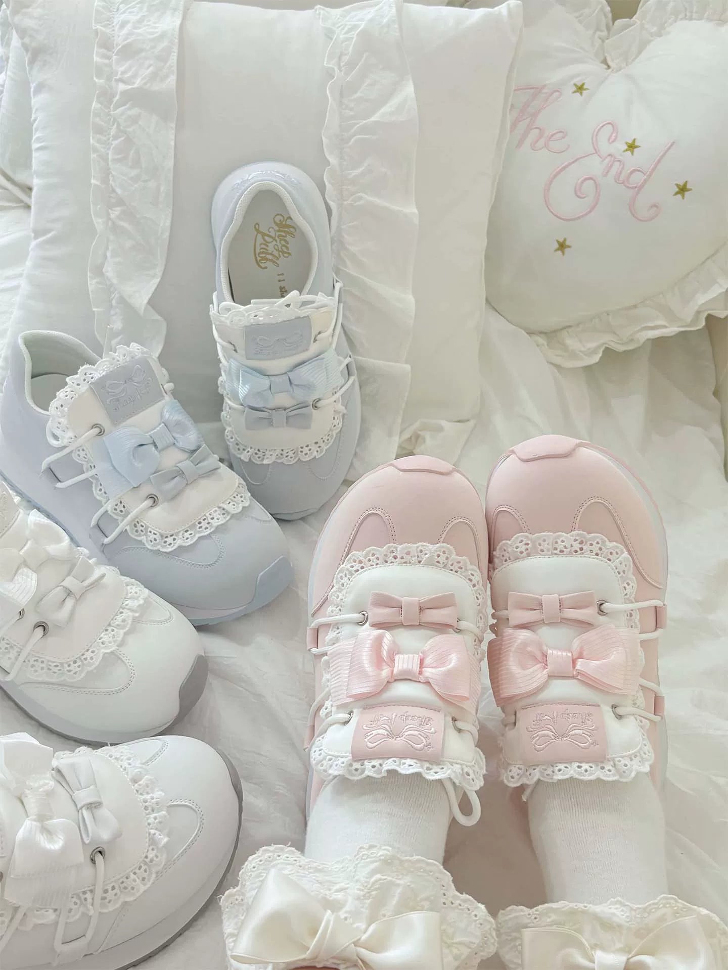 Sheep Puff Thousand Bow Lolita Sneakers featuring white shoes with decorative bows and playful sheep puff details.