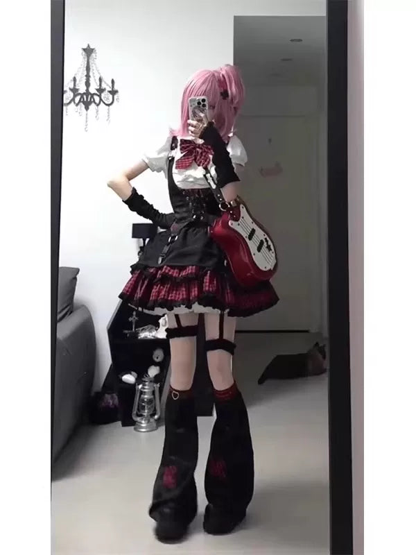 Red-and-black Lolita outfit set with plaid ruffle skirt, vest and leg covers shown in a mirror.