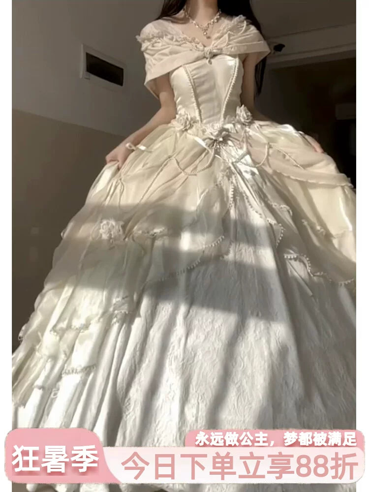 Model wearing champagne Flora Muse Rose Encounter lolita gown, front view