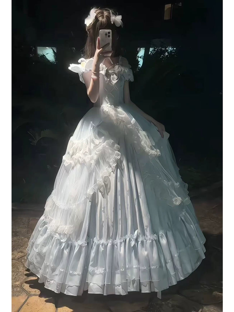 Detail of the tiered ruffled skirt and sheer tulle overlay on the Lolita gown