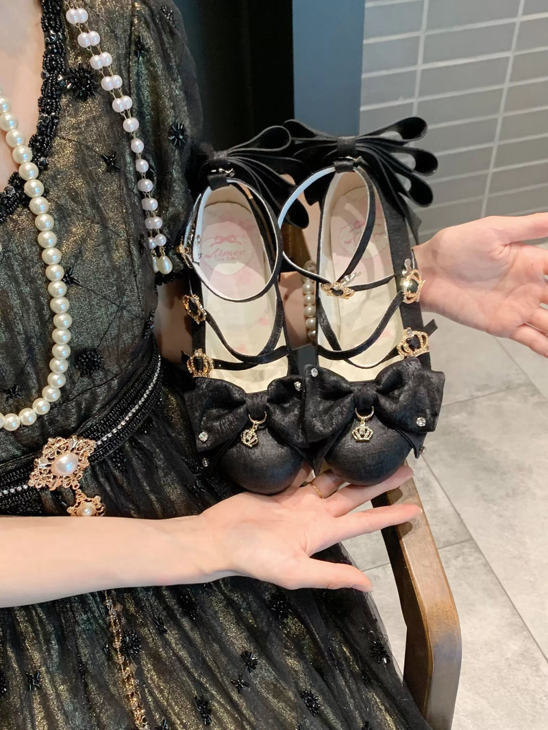 Aimee Gilded Coronation Lolita shoes — black shoes held for a front view