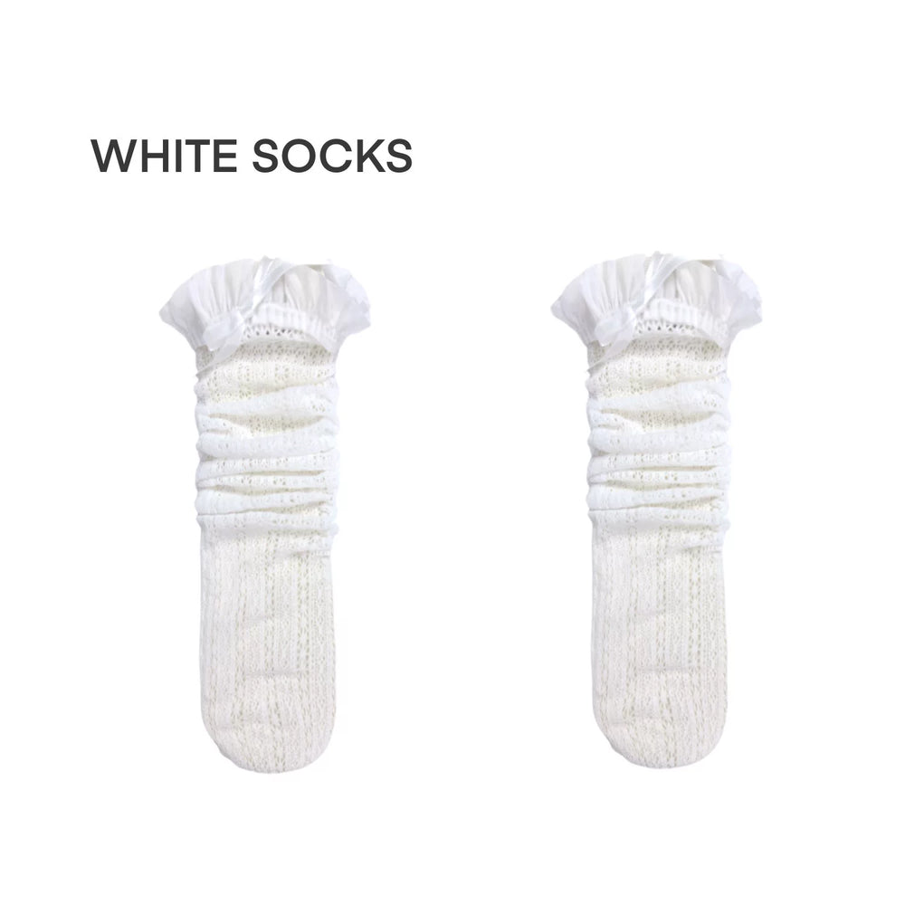 Openwork mid-calf socks with ruffled cuffs and bow details