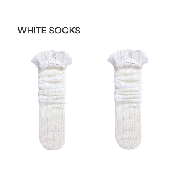 Openwork mid-calf socks with ruffled cuffs and bow details