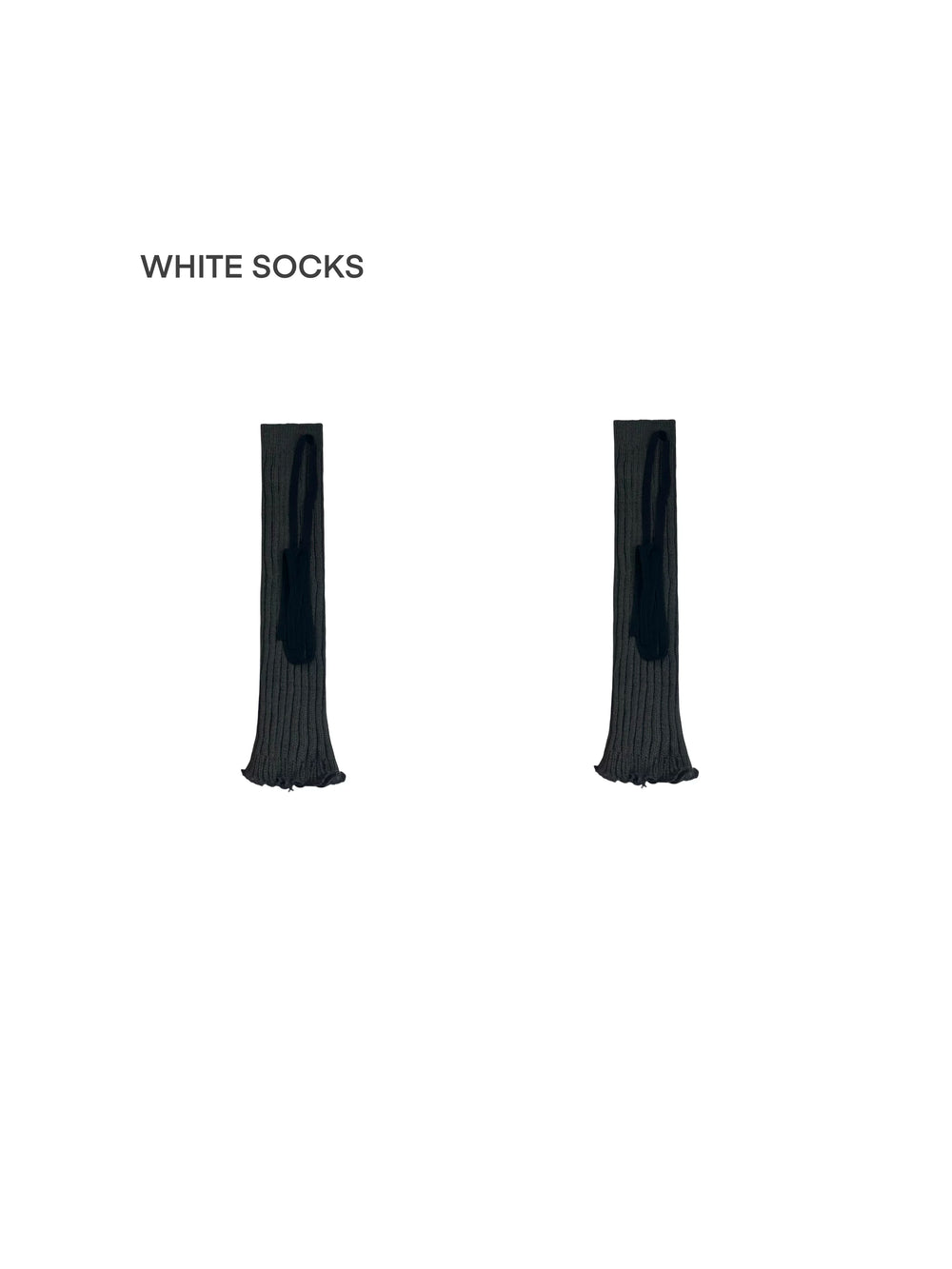 White, gray and black ribbed leg warmers with wraparound strap details styled with black platform shoes
