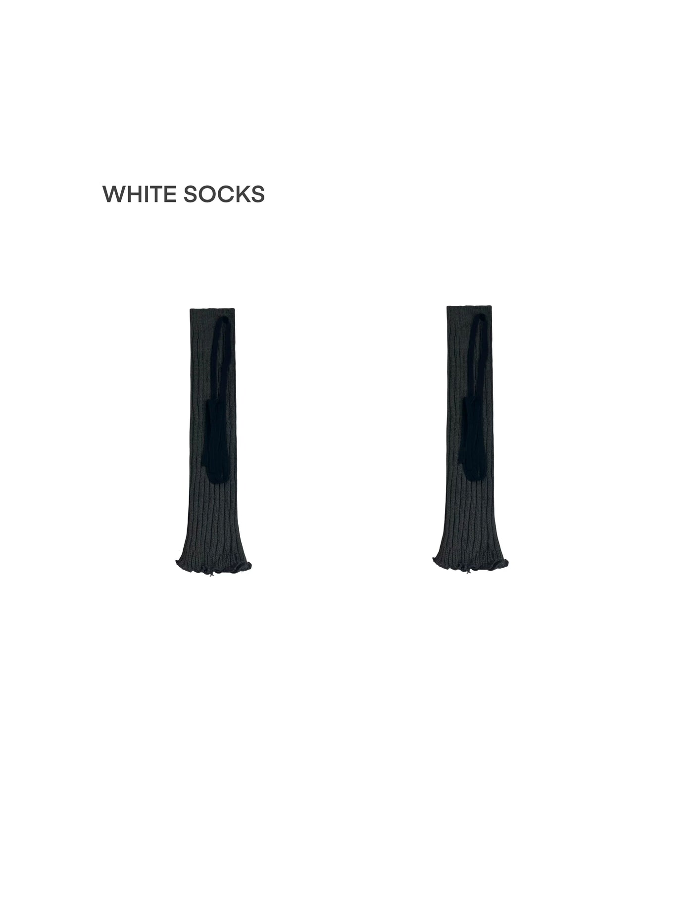 White, gray and black ribbed leg warmers with wraparound strap details styled with black platform shoes