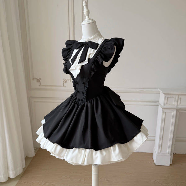 Black-and-white ruffle-sleeve one-piece dress set with white bib and bow tie
