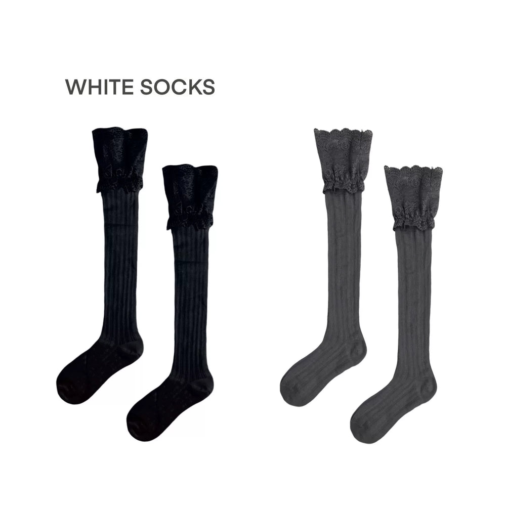 White ballet-style mid-calf socks with lace cuffs and patterned panels
