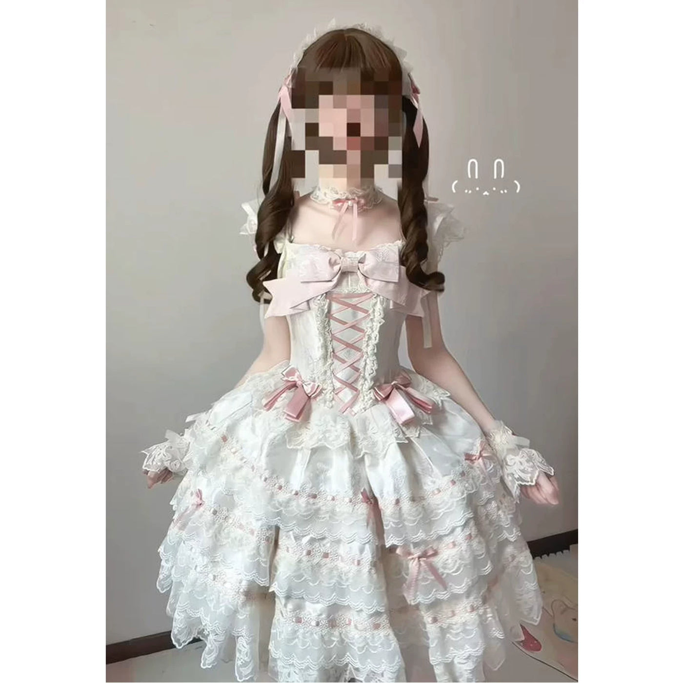 Creamy apricot JSK dress set with layered lace tiers, pink bows and a train.