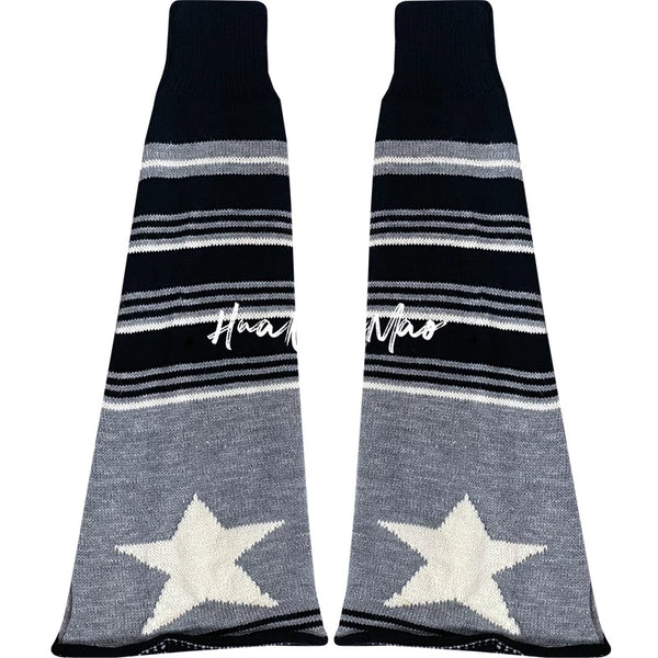 Subcultural gray knit leg warmer with horizontal black, white, and grey stripes and retro star motifs, ribbed top edge, rolled ankle cuff