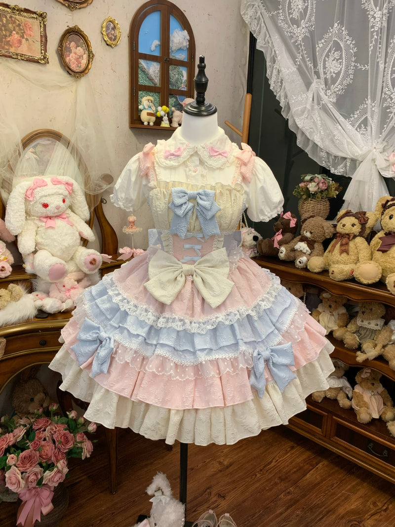 Back view of JSK on mannequin, showing corset-style ribbon lacing and large back bow