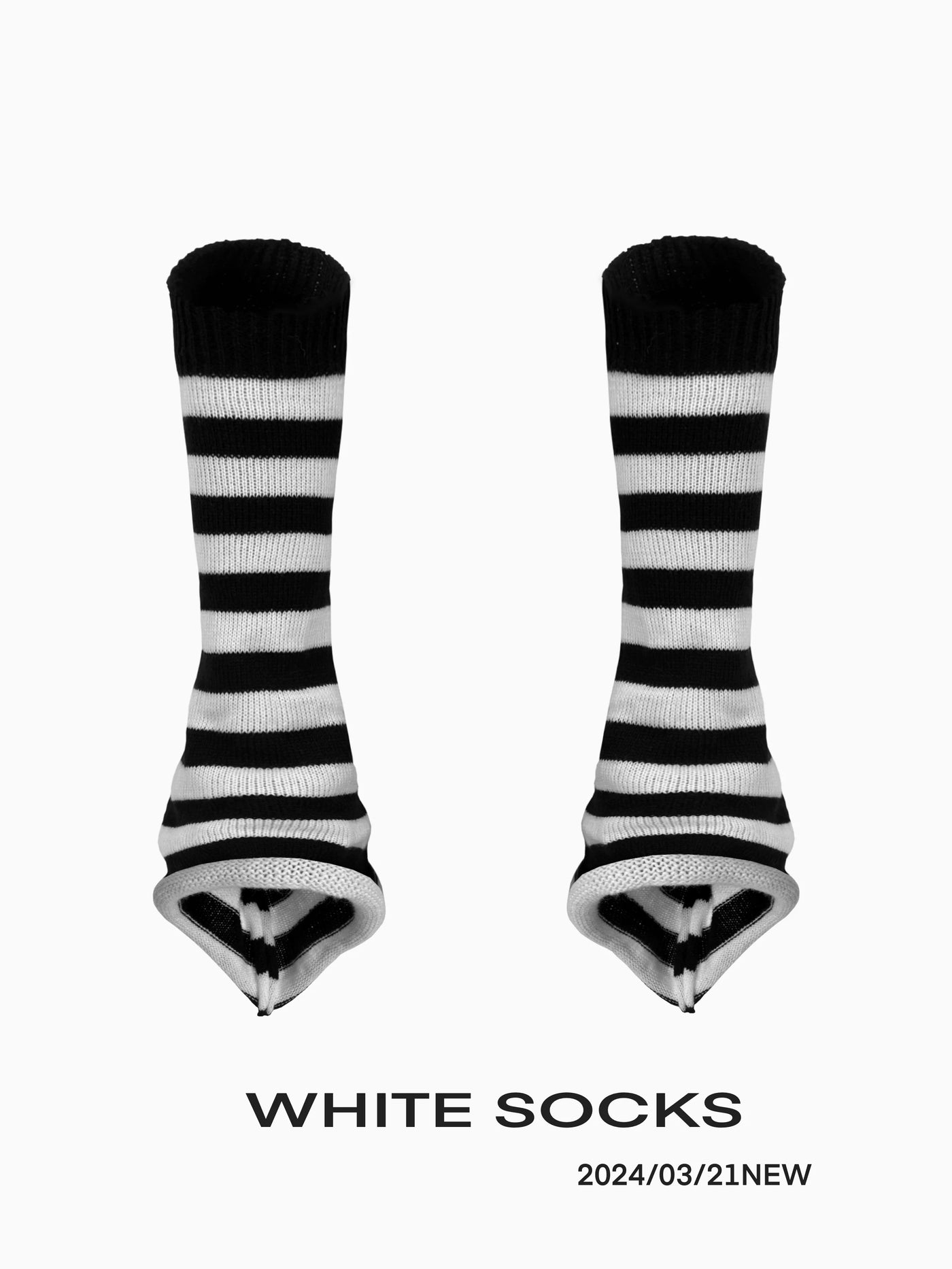 White Socks black and white knitted slouch socks styled over sneakers