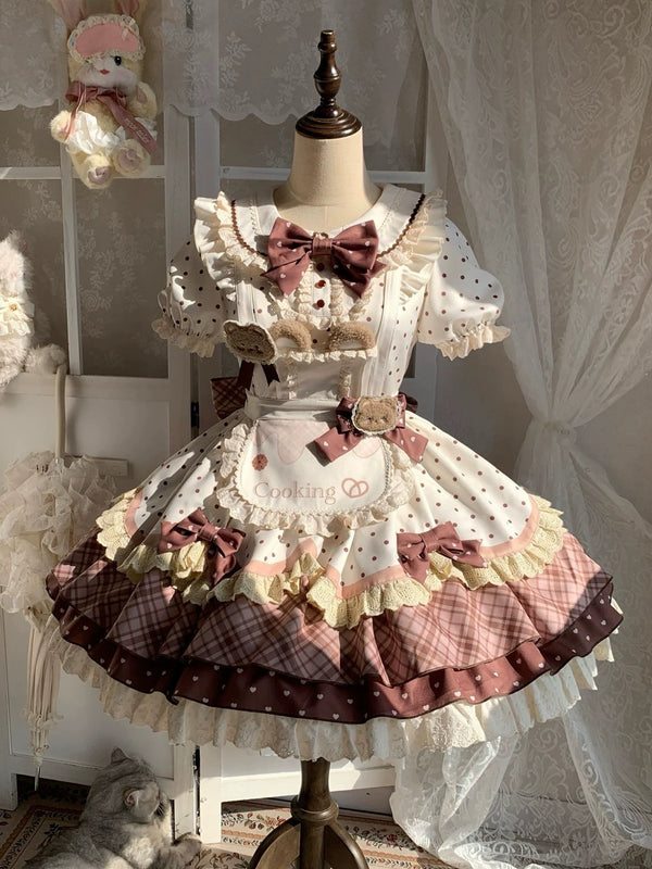 Creamy brown, cream and pink bear cooking apron one-piece dress set on a mannequin.
