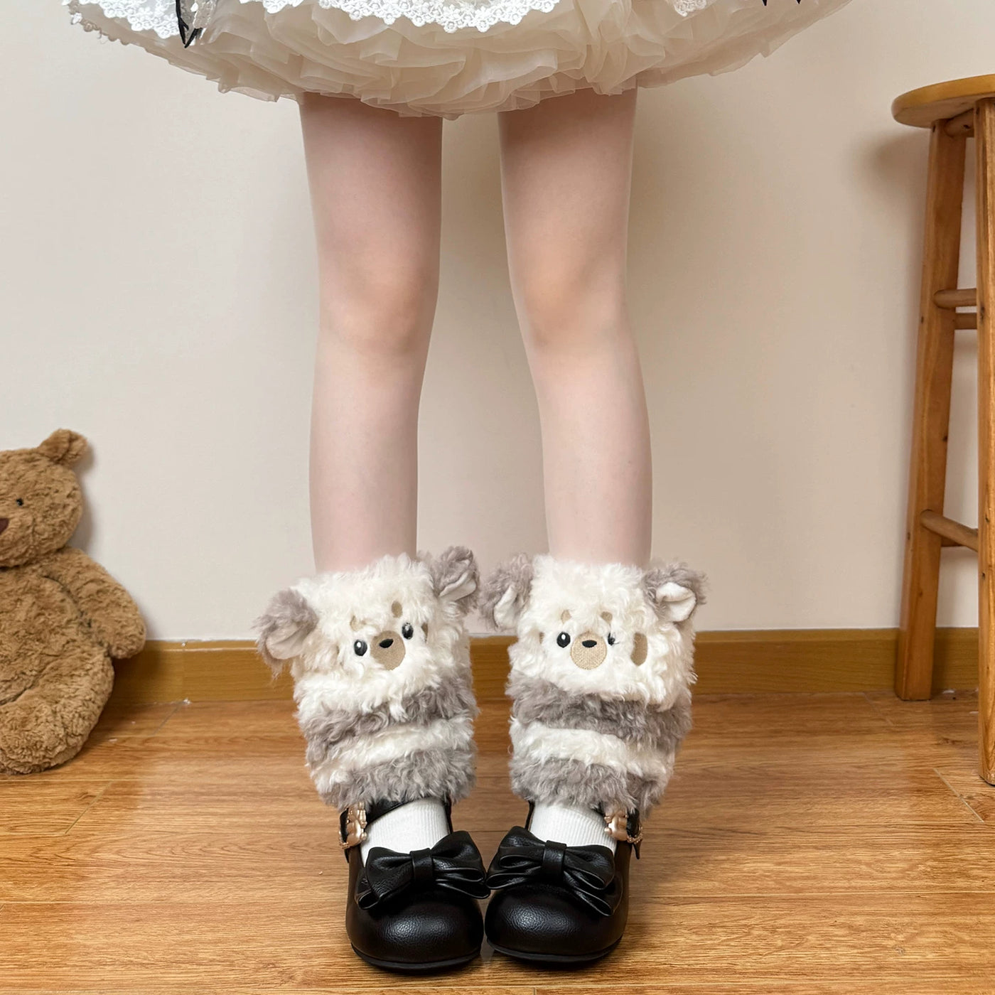 White face plush leg warmer with four-eyed puppy motif