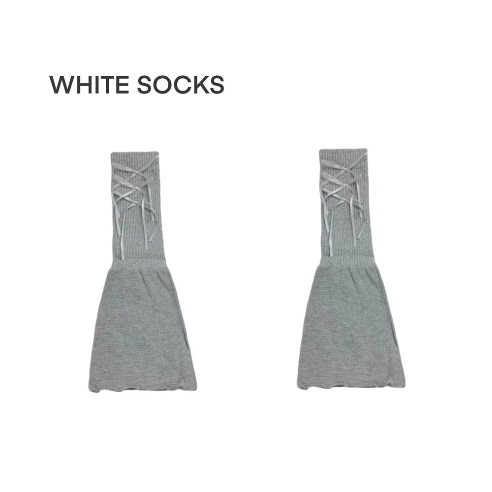 Milk white slouch sock covers with ribbon lacing styled with metallic Mary Jane shoes.