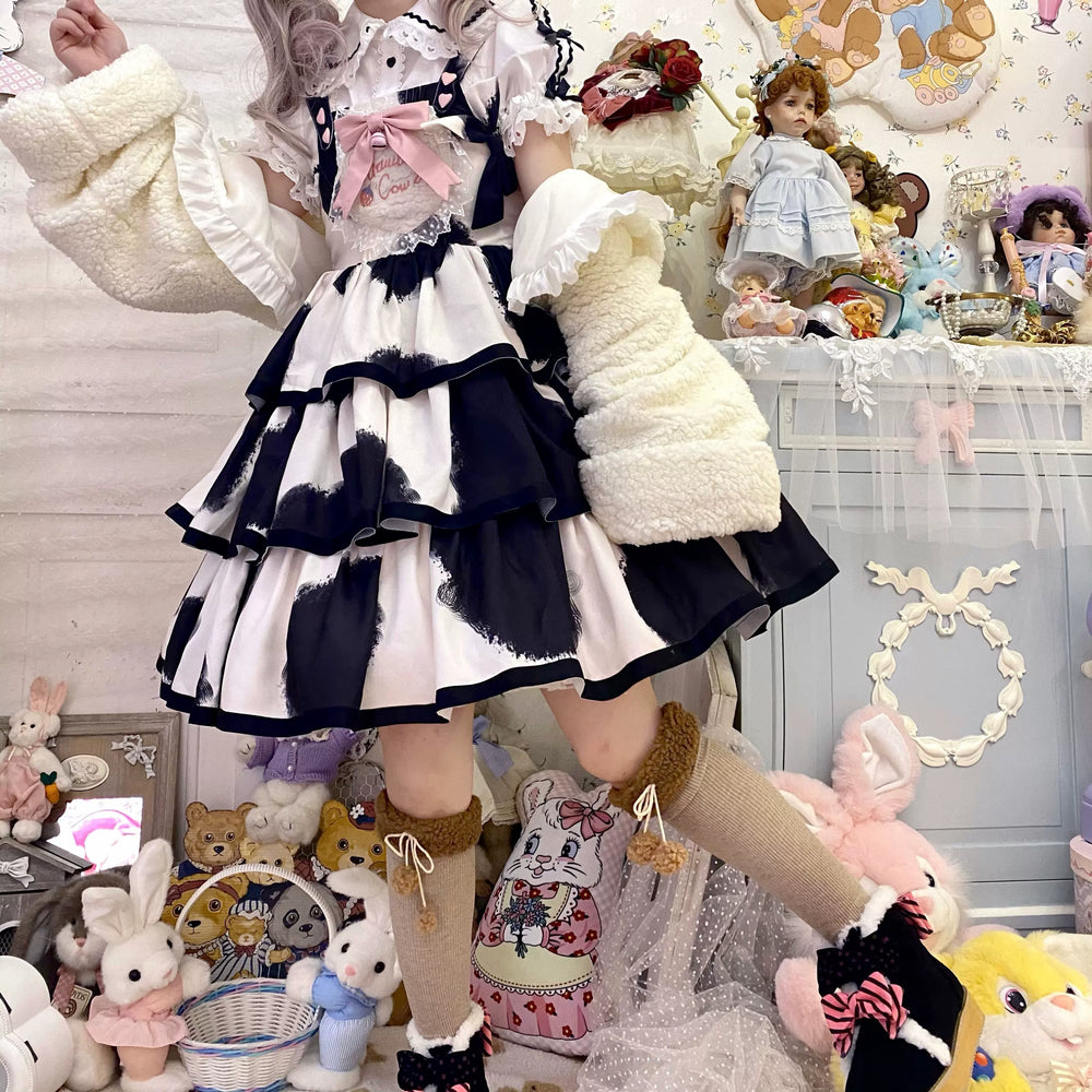 Pastel blue and white JSK styling with a three-section skirt and bow details.