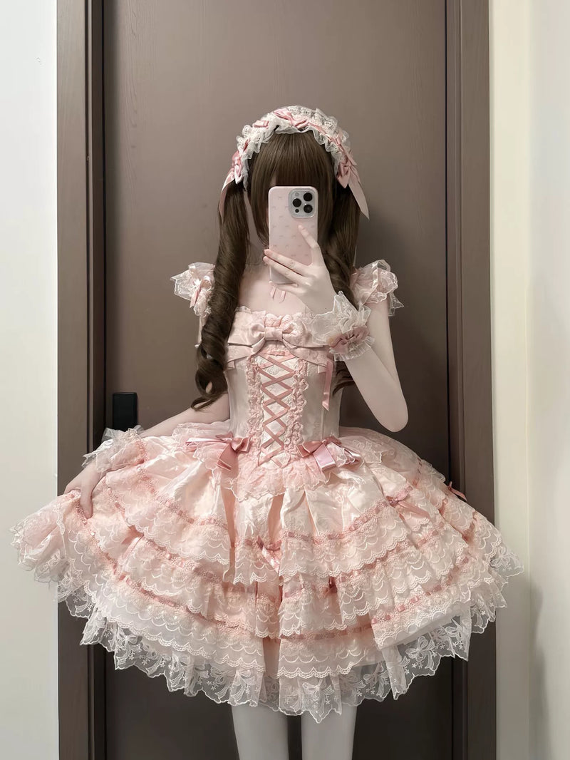 Pink Lolita dress set with matching petticoat displayed on a mannequin