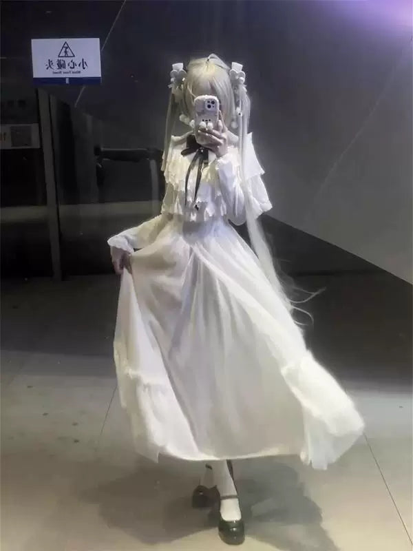 White long-sleeved Sweet Lolita OP dress with ruffled collar and black bow