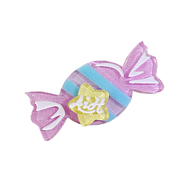 Candy-shaped plastic Lolita accessory in pastel purple, blue and yellow.
