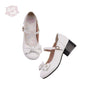 Chaussures à talon mi-haut, bout arrondi et fini mat blanc / 34