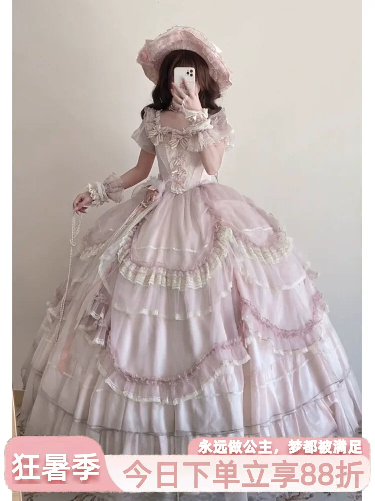 Flora Muse pink Sweet Lolita wedding gown with tiered ruffled skirt and off-the-shoulder sleeves