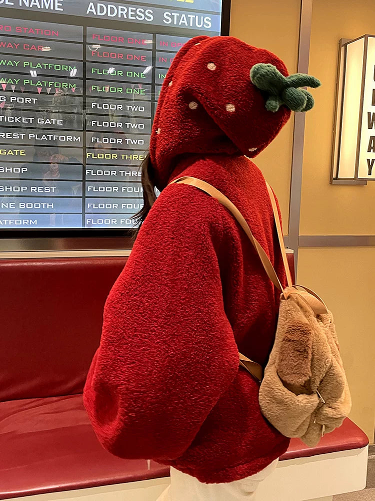 Dark red plush hooded jacket with strawberry embroidery and an oversized hood
