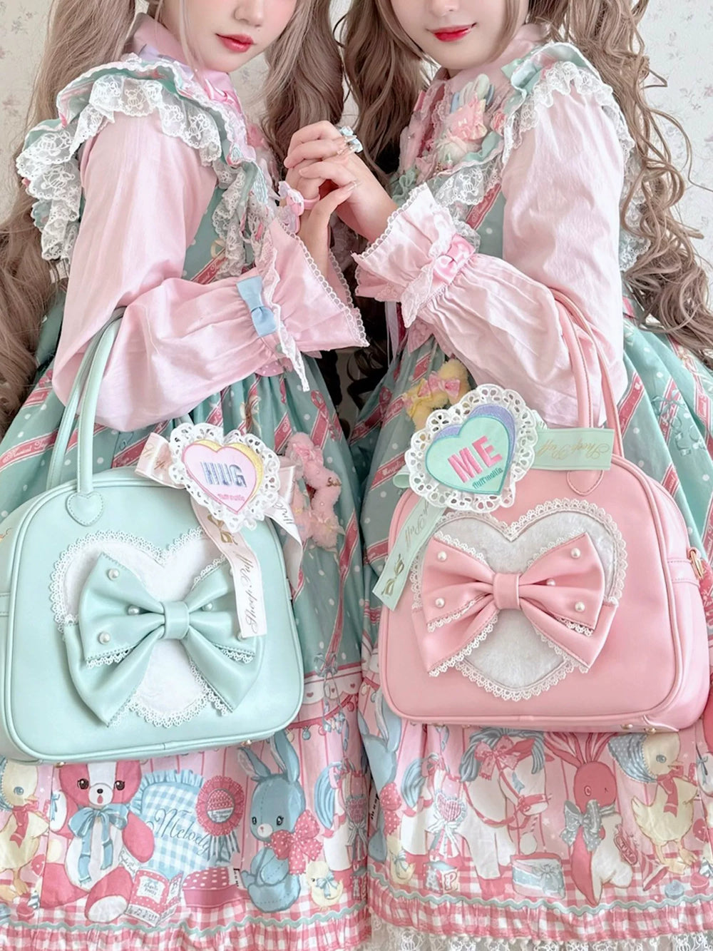 sheeppuff Heart Lace Boston bag in pink with a heart panel and bow.