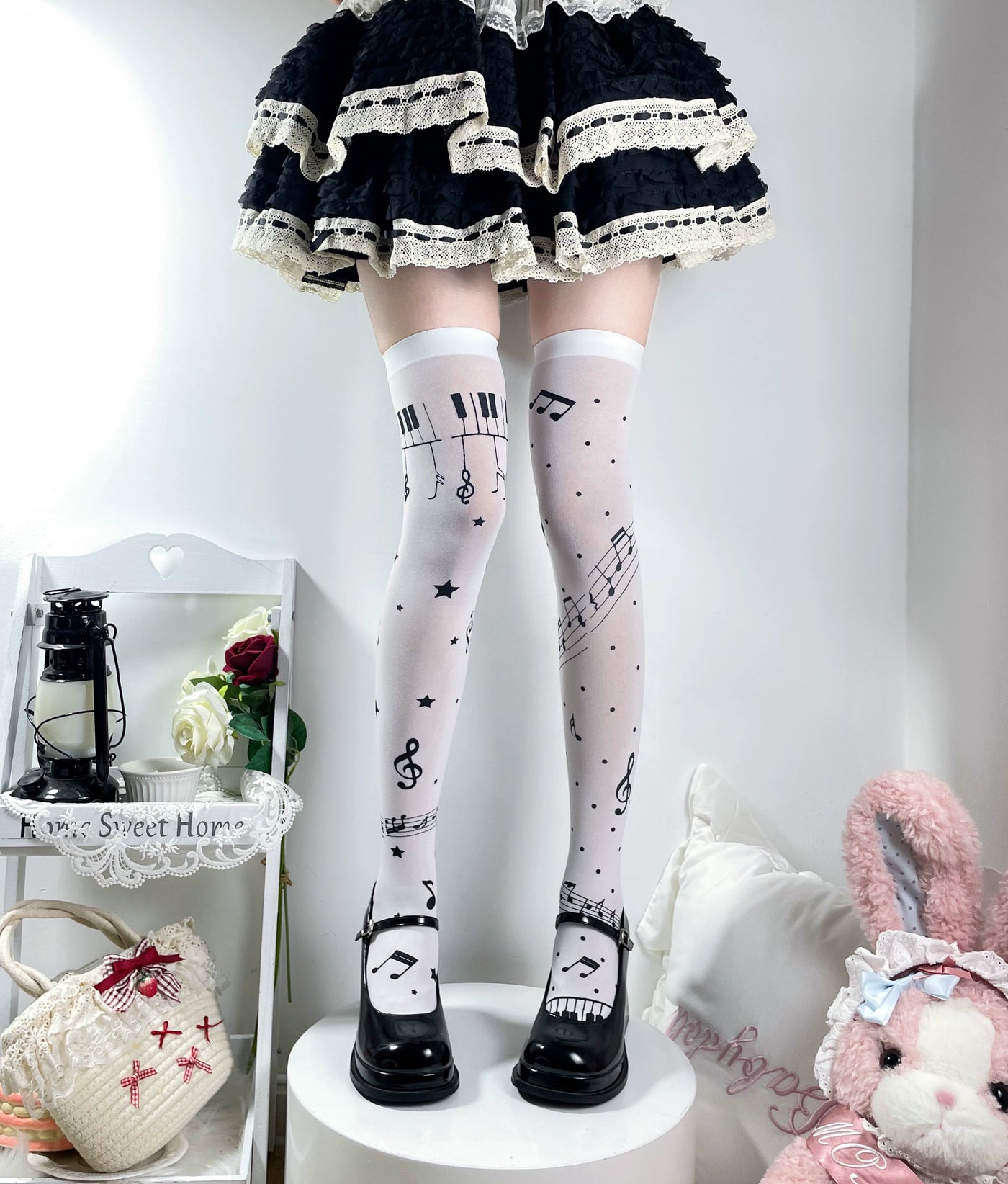 Fantasy Doll white over-the-knee socks with piano keys, musical notes and stars.