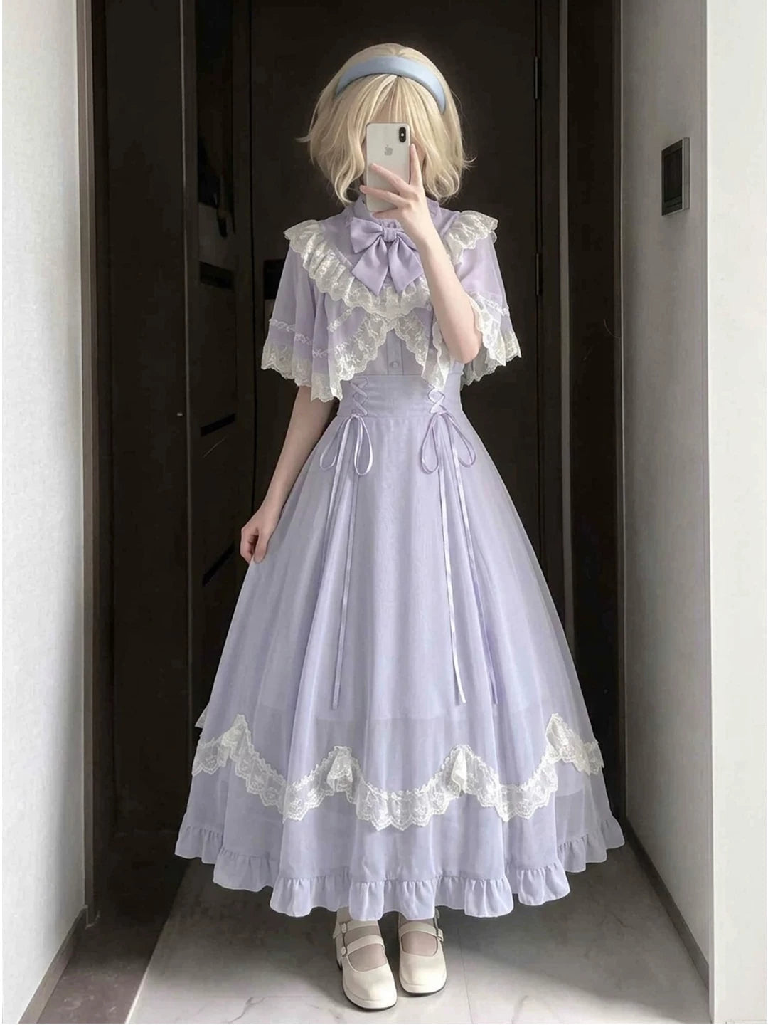Lavender OP dress with a lace-trimmed cape shown on a wearer.