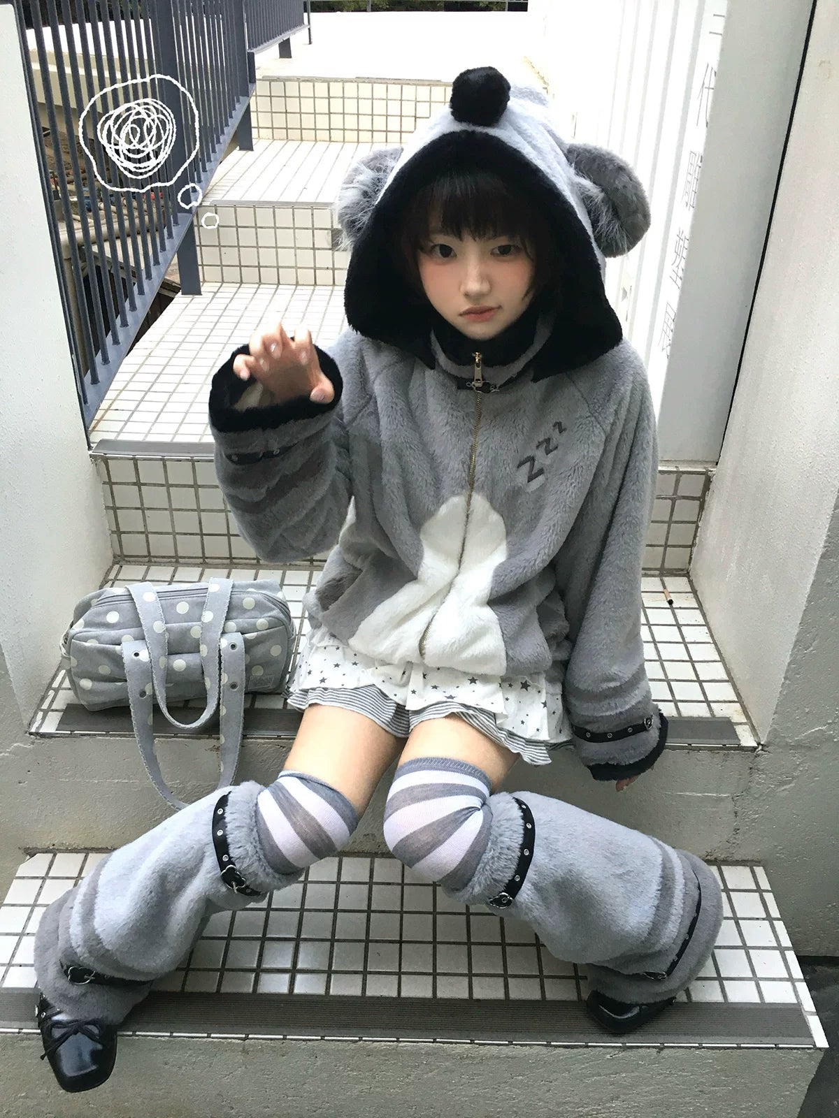 Gray koala hooded coat with rounded ears and matching leg warmers worn by a model.