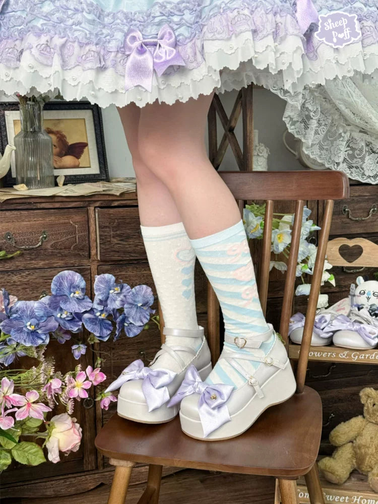 Sheep Puff satin doll platform Lolita shoes with rounded toe and decorative bows, featuring a soft pink satin finish.