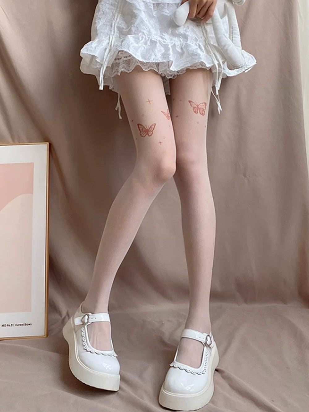 Fantasy Doll skin-tone pantyhose with wine red butterfly motifs