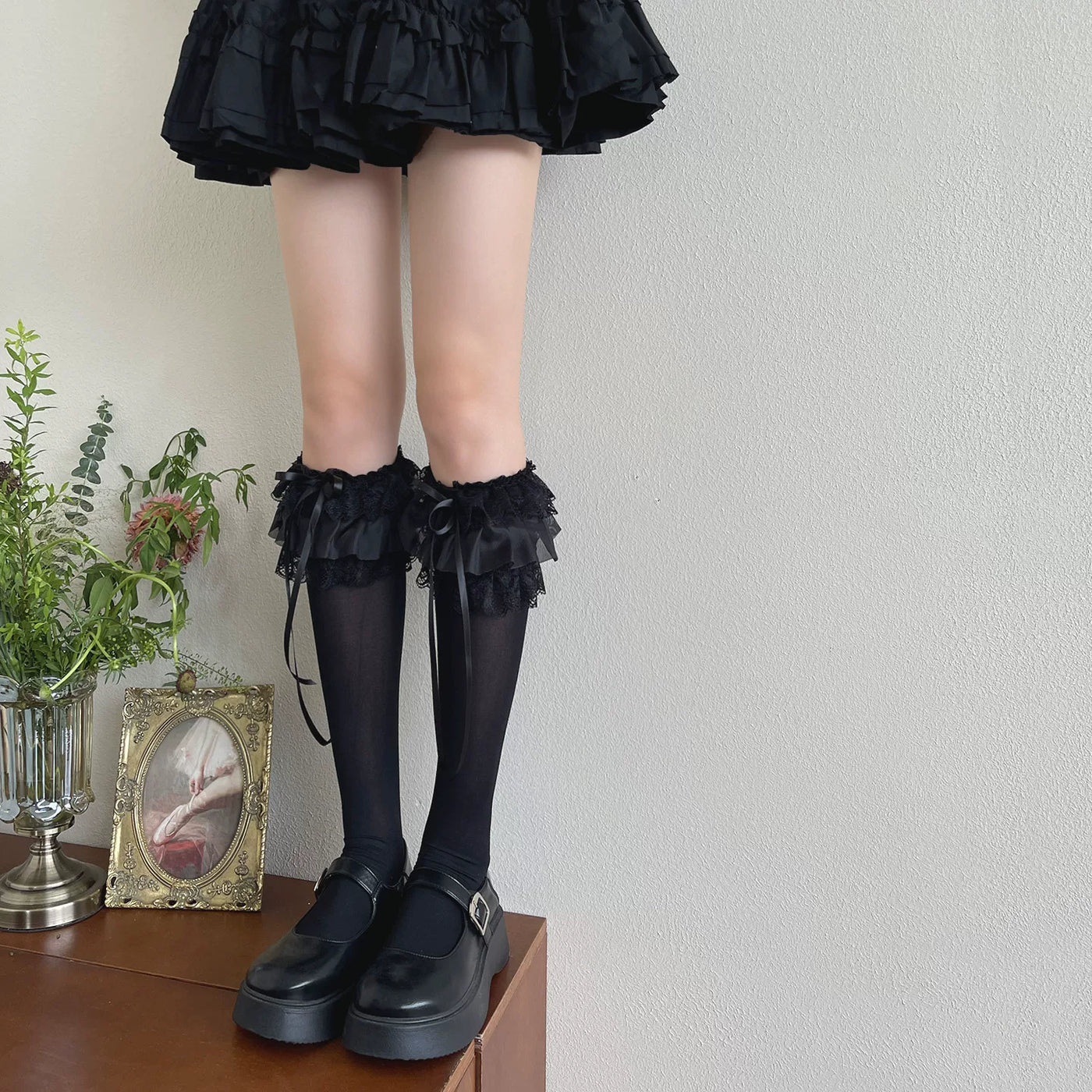 Black long-calf Sweet Lolita sock with layered ruffle cuff