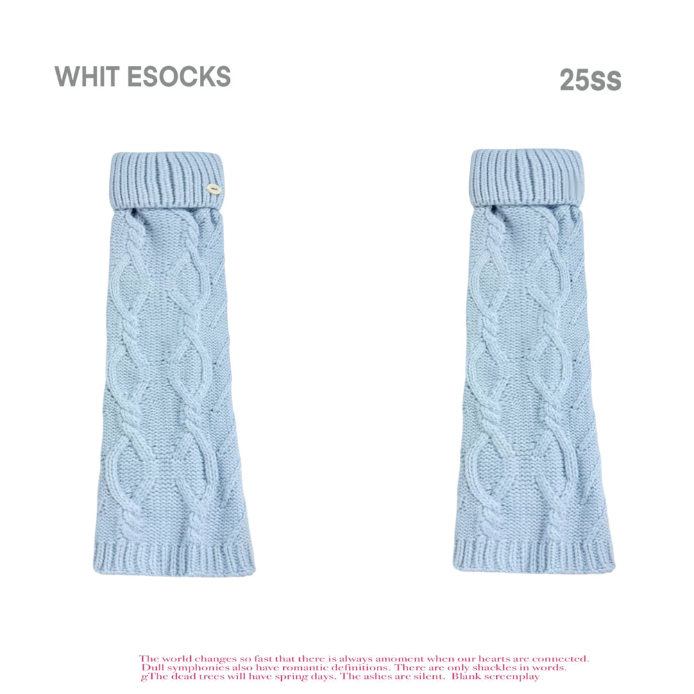 Baby blue and grey cable-knit turn-cuff leg warmers shown with flats.