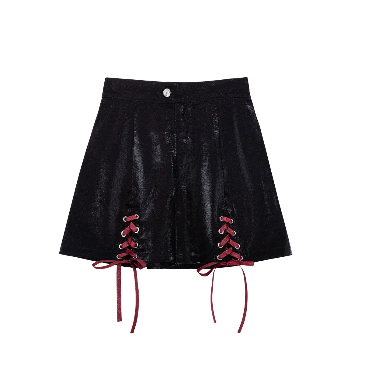 Black lace-up shorts and burgundy arm sleeves with buckle details.